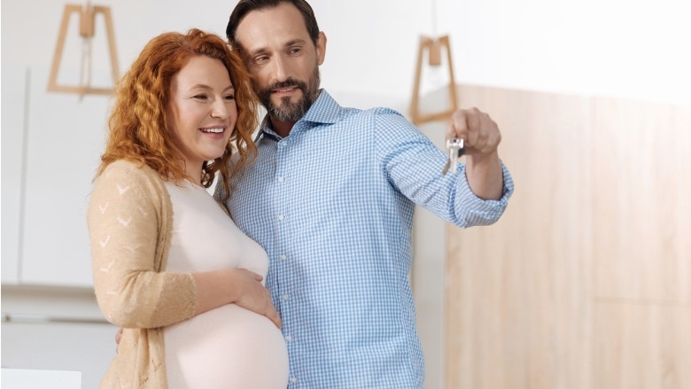 Pregnant couple buying a new home